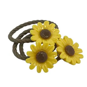 کش مو زنانه مدل گل افتابگردان بسته 3 عددی