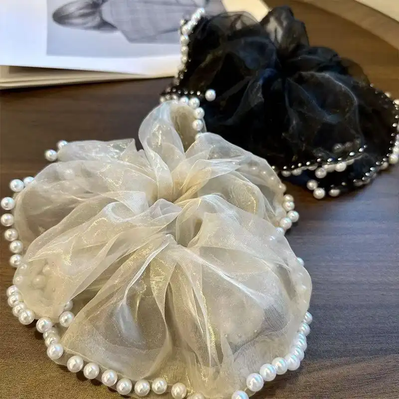 کش مو زنانه مدل پارچه ای ژورژت طرح مروارید دار بزرگ