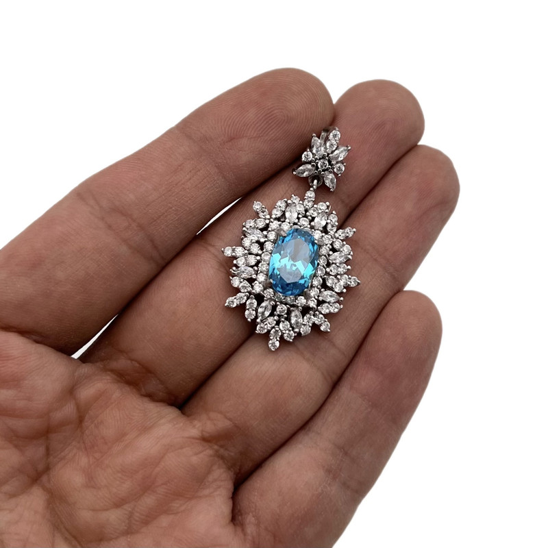 آویز گردنبند نقره زنانه مدل توپاز NG8718 رنگ آبی آویز گردنبند نقره زنانه مدل توپاز NG8718 رنگ آبی