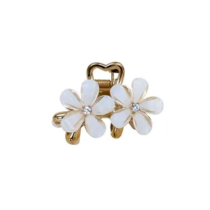 کلیپس مو زنانه مدل گل مینا