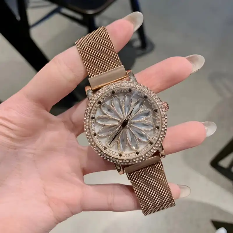 ساعت مچی عقربه ای زنانه مدل دور نگین صفحه چرخان بند فلزی قفل مگنتی