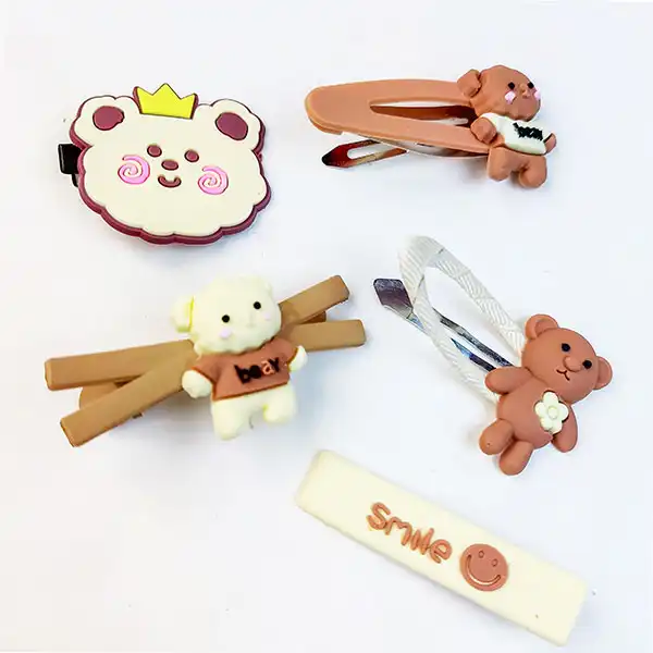 گیره مو زنانه مدل سیلیکونی 4018 طرح تدی کارت فانتزی  رنگ کرم قهوه ای مجموعه 14 عددی