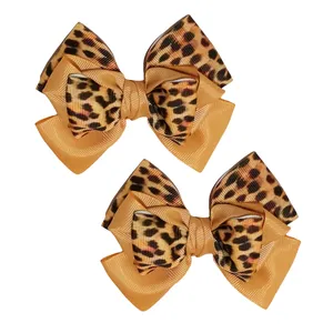 گیره مو دخترانه مدل فنری پلنگی بسته 2 عددی