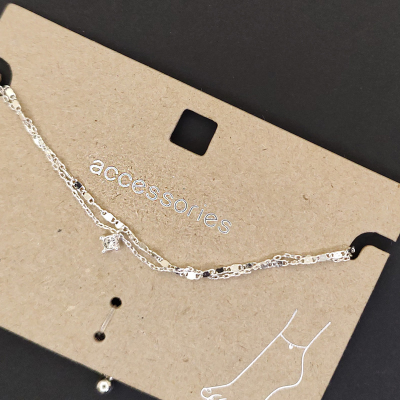 پابند زنانه اکسسورایز مدل دو لاین نگین آویز