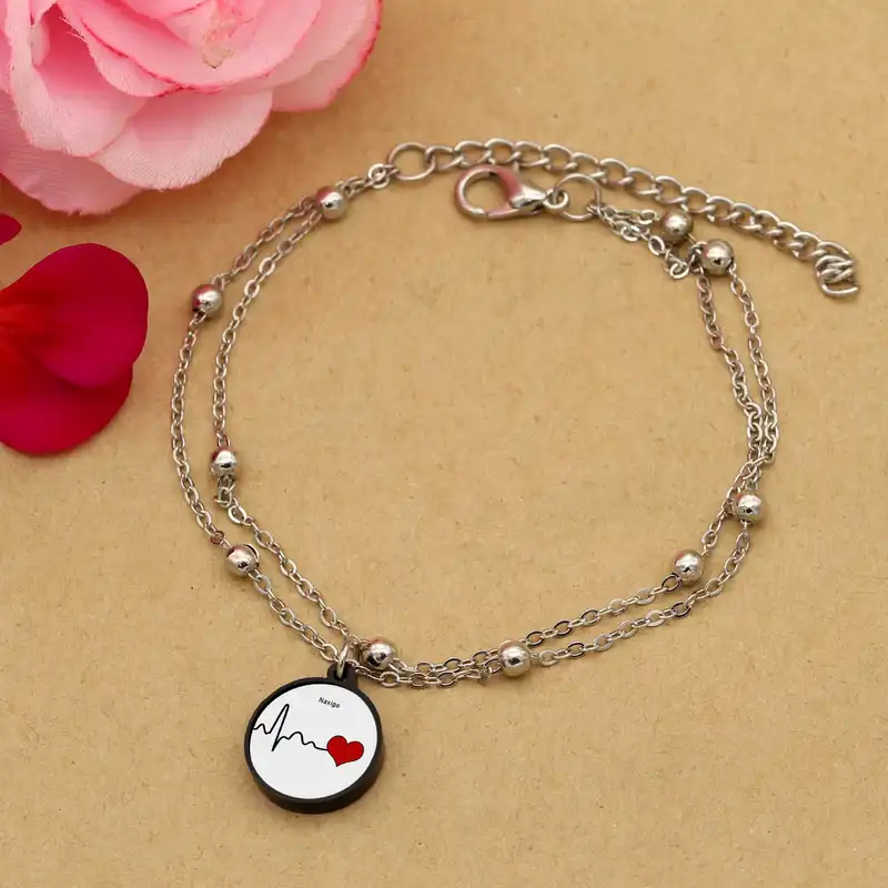 پابند زنانه ناکسیگو مدل شب تاب طرح ضربان قلب کد LB7463