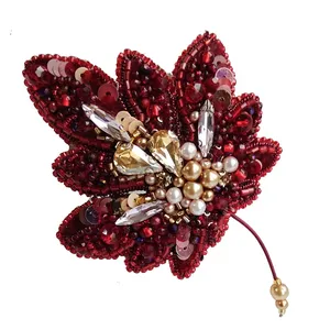 گل سینه زنانه مدل برگ