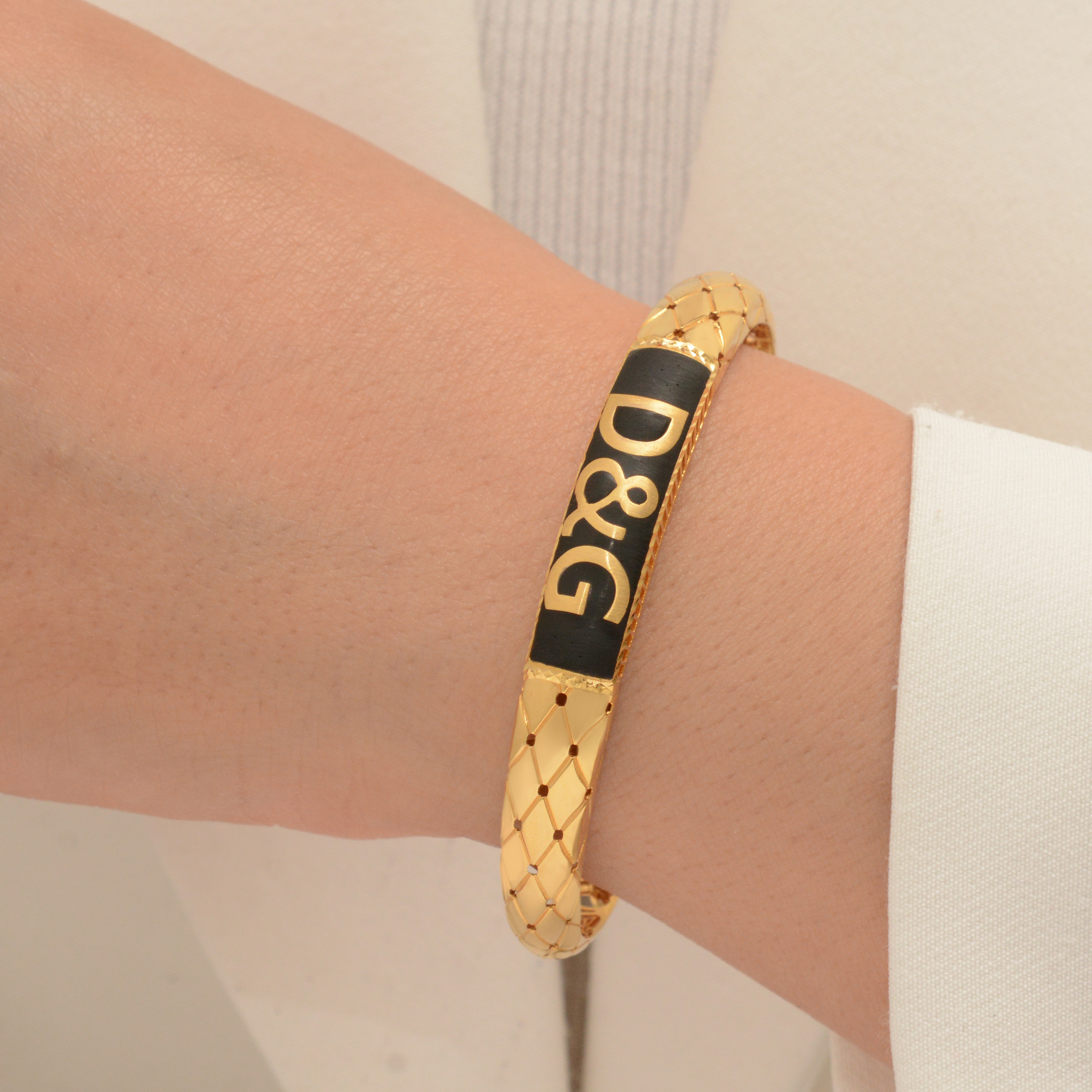 دستبند النگویی طلا 18 عیار زنانه طلای مستجابی مدل آوا کد DG23