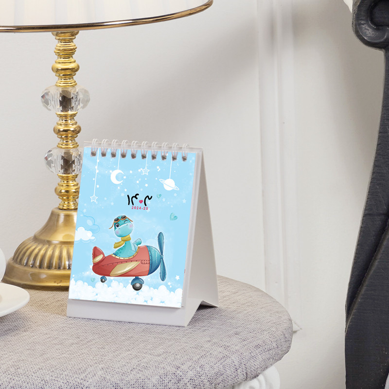 تقویم رومیزی سال 1403 طرح دایناسور فانتزی مدل خلبان تقویم رومیزی سال 1403 طرح دایناسور فانتزی مدل خلبان