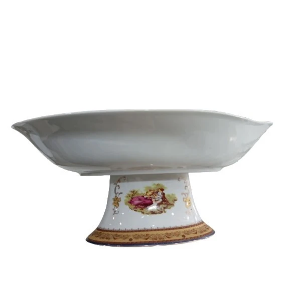 عکس شماره 4 : میوه خوری چینی پردیس کاشان پایه دار دفرمه برای سرو میوه، آجیل، شکلات و سالاد، ابعاد 35×25×4 سانتی متر، وزن 1250 گرم، شستشوی دستی، همراه جعبه