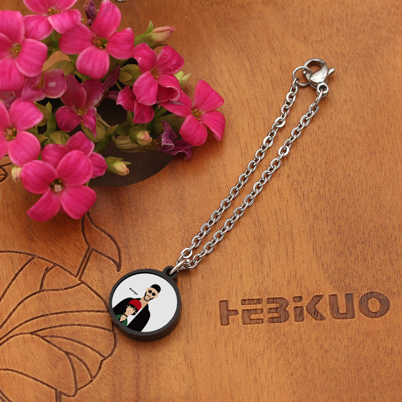 آویز ساعت زنانه ناکسیگو مدل شب تاب طرح لئون کد AW8747