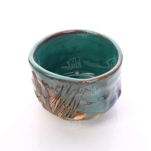 ‎پیاله چایخوری سفالی‎‎ ‎‎‎لعاب پاشیده رنگ‎ ‎فیروزه ای‎ ‎‎طرح‎ ‎خراش مدل 1004000105