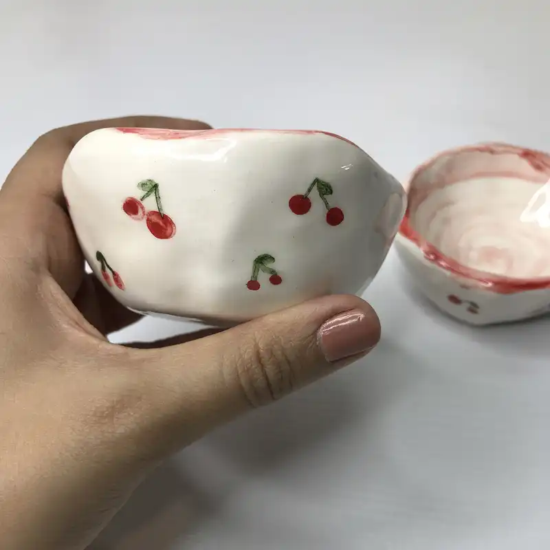 پیاله سرامیکی مدل دفرمه طرح گیلاس مجموعه 2 عددی