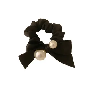 کش مو زنانه مدل مخملی طرح دو مروارید