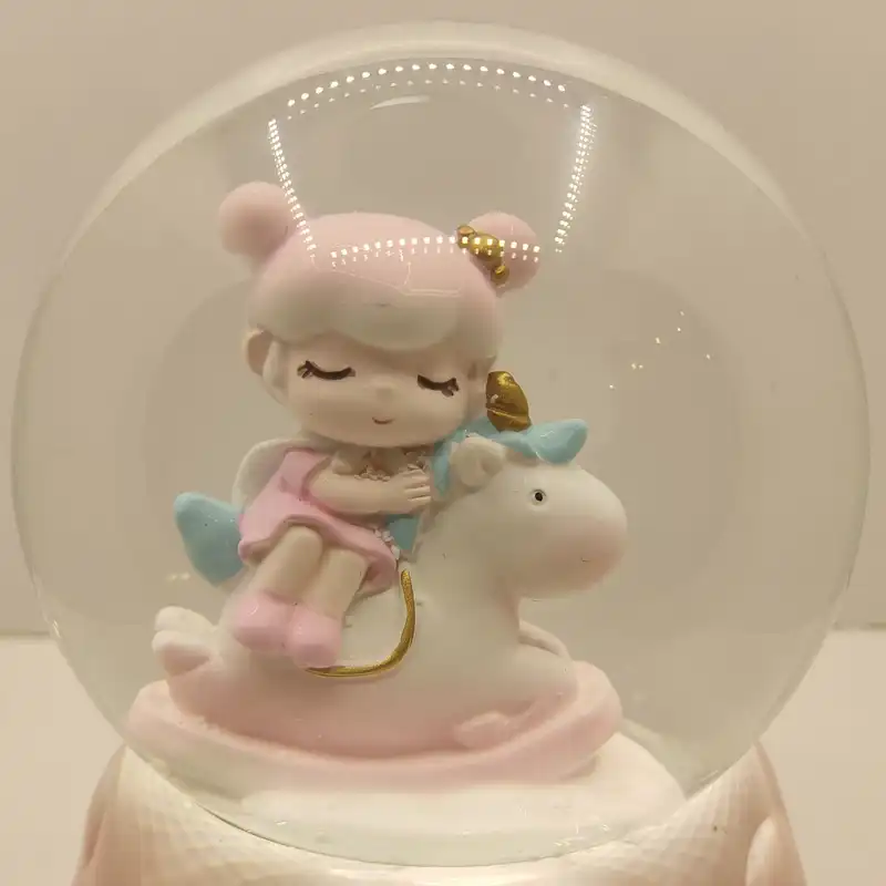 گوی موزیکال مدل پمپی دختر کوچولو و اسب تک شاخ