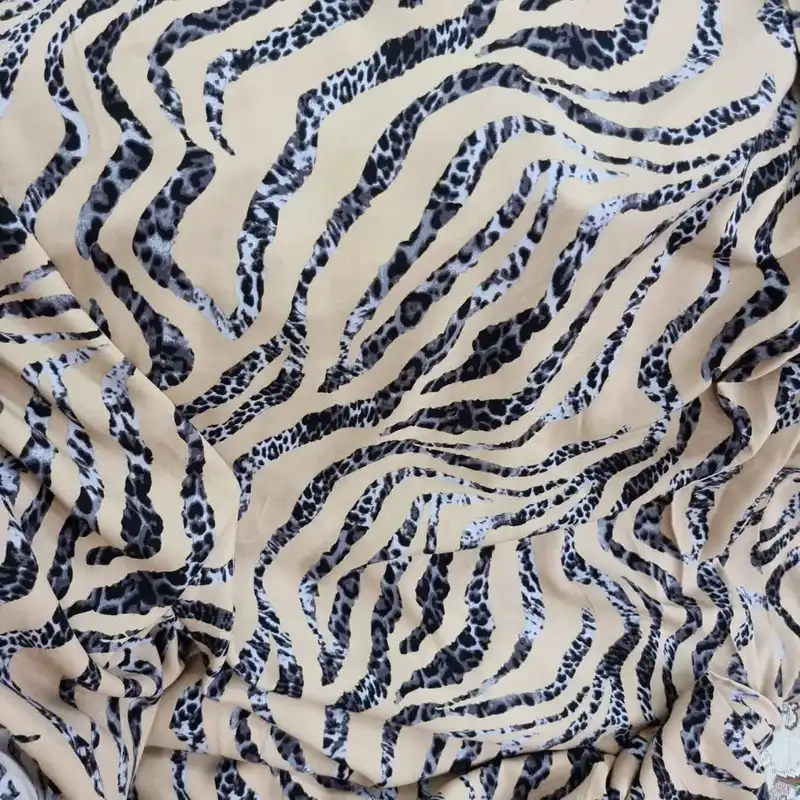 پارچه لباس مدل کودری نخی طرح پوست ماری