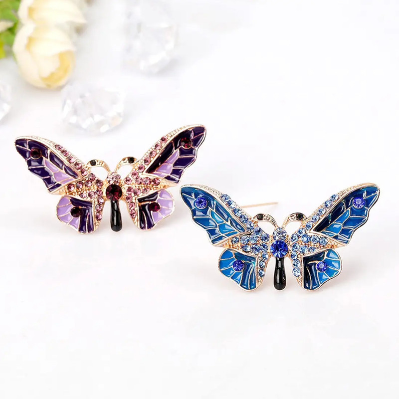 گل سینه زنانه مدل پروانه مجلل نگین دار