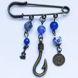 گل سینه زنانه مدل سکه کلوپاترا