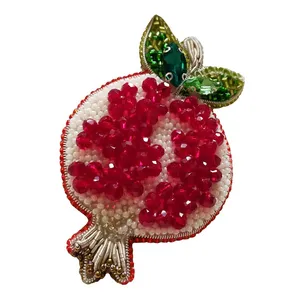 گل سینه زنانه مدل انار یلدا