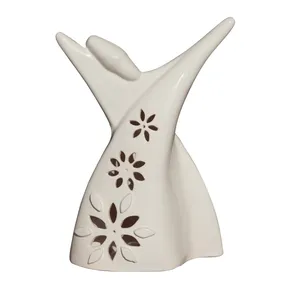 جا شمعی سرامیکی مدل رقص سماع طرح گل برجسته