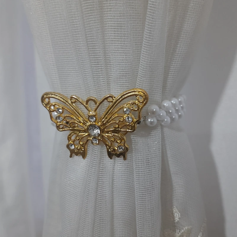 عکس شماره 4 : پرده جمع کن مدل پروانه