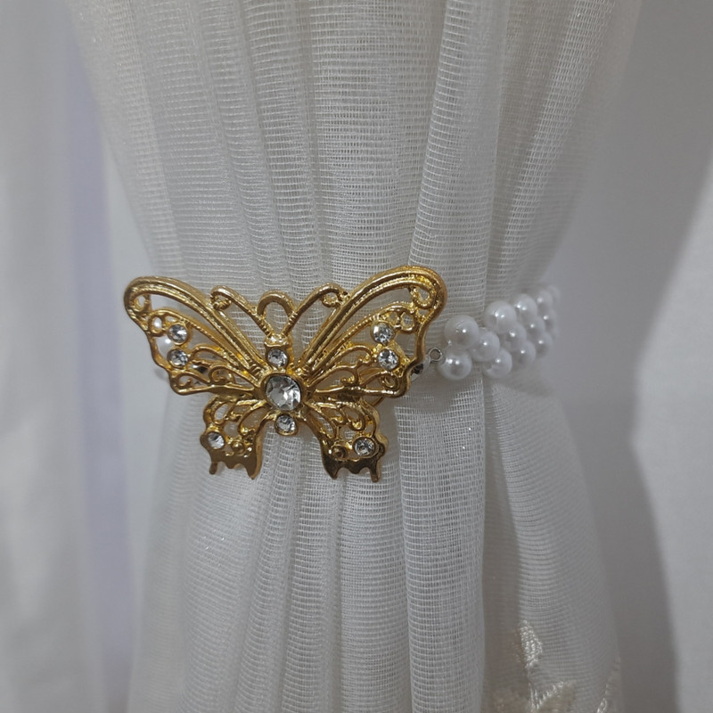 پرده جمع کن مدل پروانه