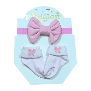 ست هدبند و جوراب نوزادی مدل 72