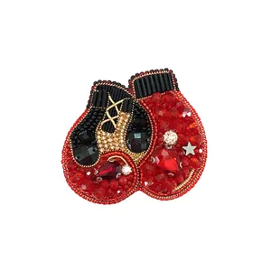 گل سینه زنانه مدل دستکش بوکس کد 754