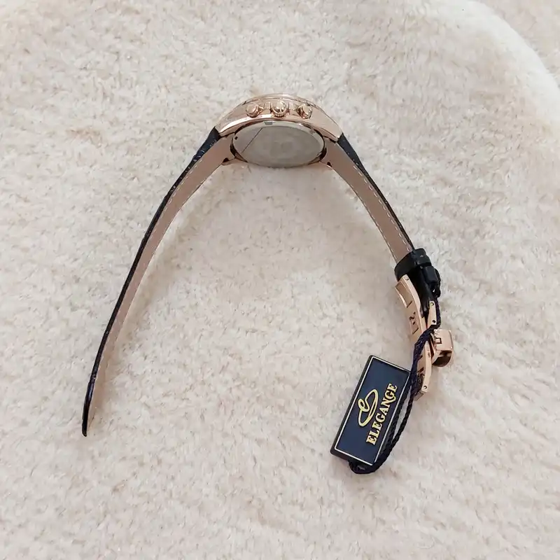 ساعت مچی عقربه ای زنانه الگانس مدل تک موتوره تقویم دار بند چرمی