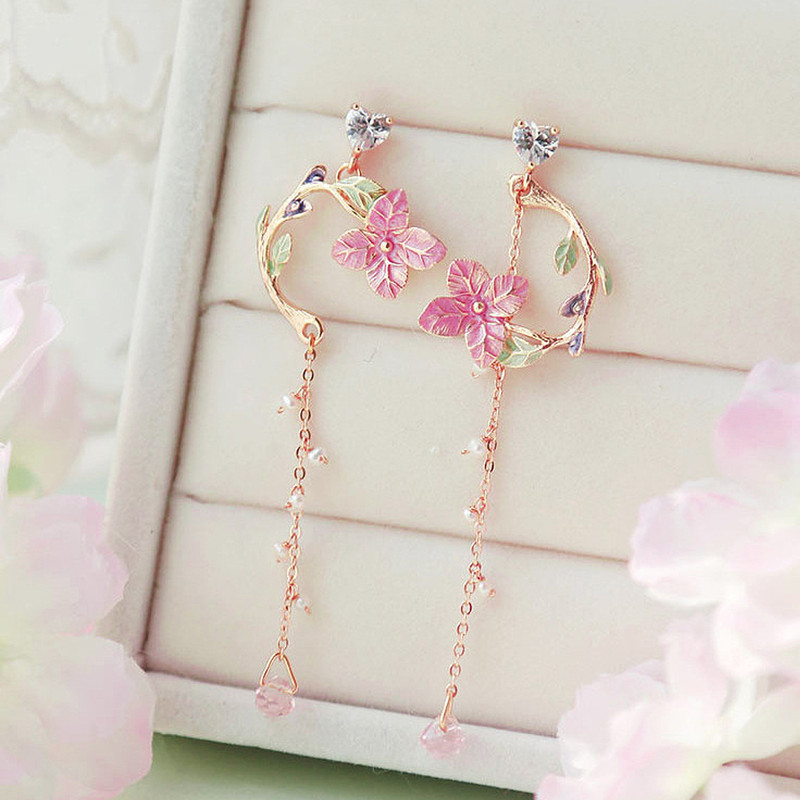 گوشواره زنانه مدل گل چهارپر کد 00667 گوشواره زنانه مدل گل چهارپر کد 00667