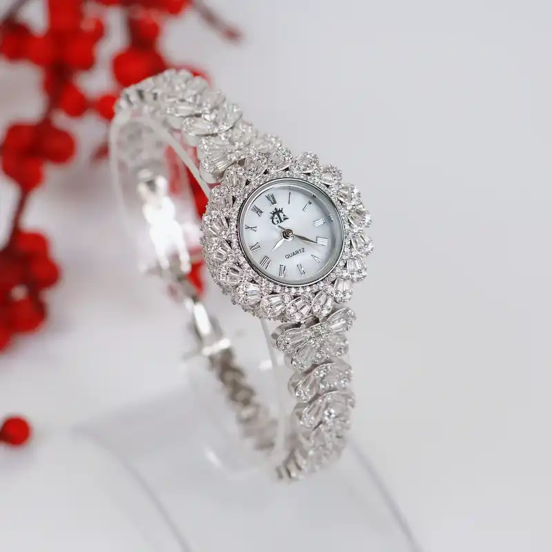 ساعت مچی عقربه ای زنانه جی تی ای مدل 72