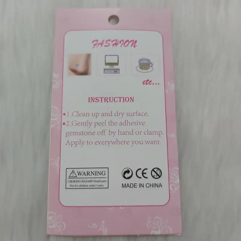 پیرسینگ بینی زنانه مدل چسبی طرح الماس کد nos110 بسته 100 عددی