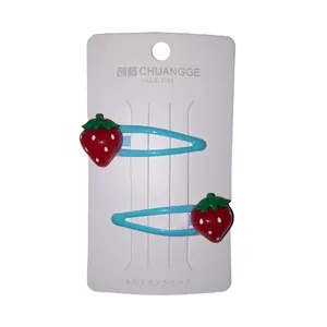 گیره مو دخترانه مدل توت فرنگی مجموعه 2 عددی