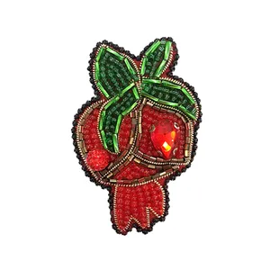 گل سینه زنانه مدل انار یلدا