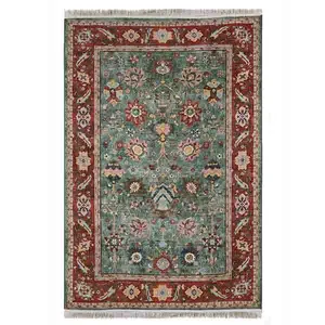 فرش ماشینی 1200 شانه فرش صرافیان زمینه سبز حاشیه قرمز مدل سلطان