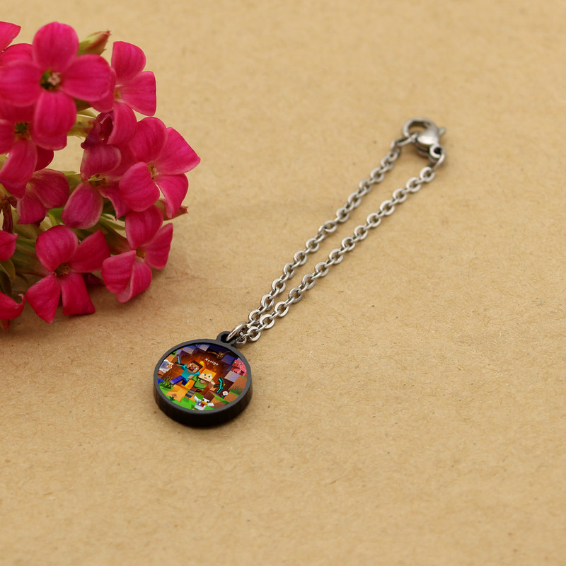 آویز ساعت زنانه ناکسیگو مدل شب تاب طرح ماینکرفت کد AW9049