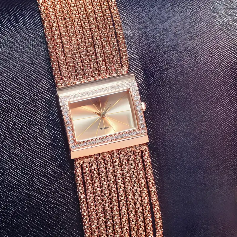 ساعت مچی عقربه ای زنانه مدل دستبندی بند پهن کد 2