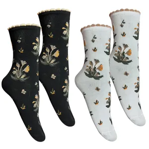 جوراب زنانه تن پوش هنگامه مدل گلدار کش کنگره ای بسته 2 عددی