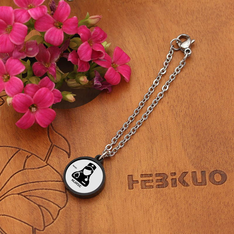 آویز ساعت زنانه ناکسیگو مدل شب تاب طرح پرستار کد AW7250 آویز ساعت زنانه ناکسیگو مدل شب تاب طرح پرستار کد AW7250