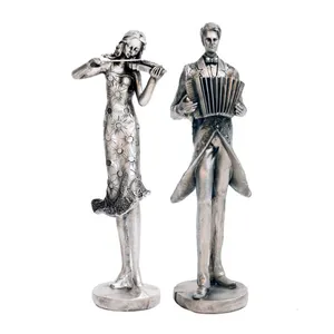 مجسمه مدل مرد و زن نوازنده ویولن و آکاردئون