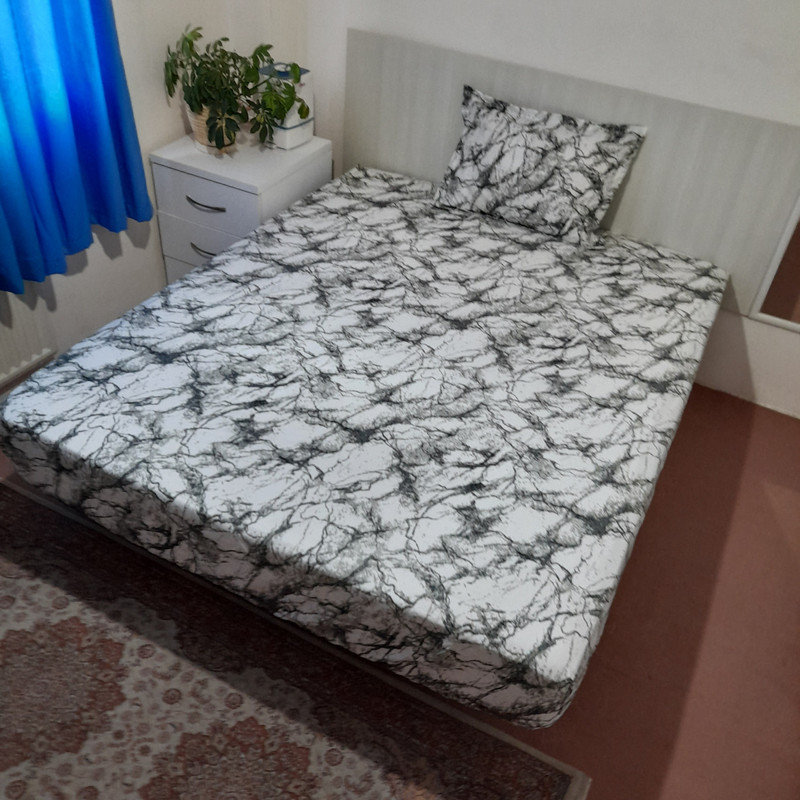 سرویس ملحفه مدل کشدار ni08087 طرح ماربل کد 100 یک نفره دو تکه