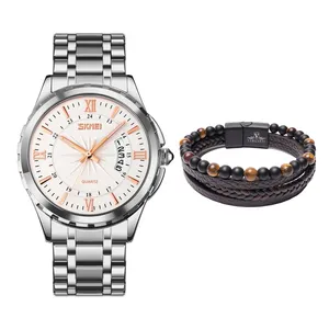 ست ساعت مچی عقربه ای و دستبند کوارتز مردانه اسکمی مدل 9069RG