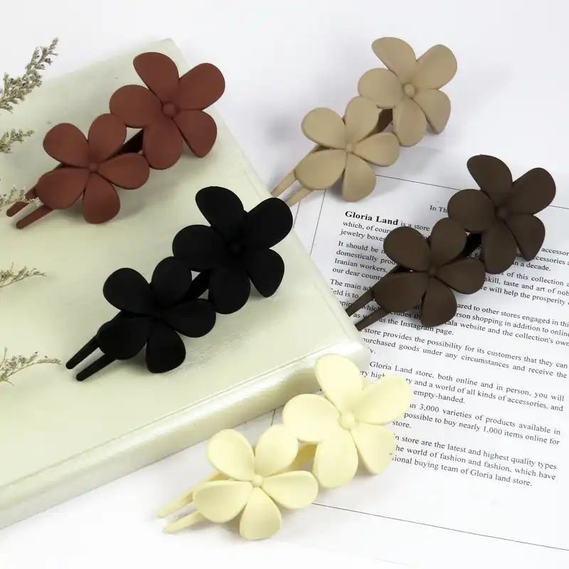 کلیپس مو زنانه مدل منقاری گل بابونه کد G_Lnd_1466