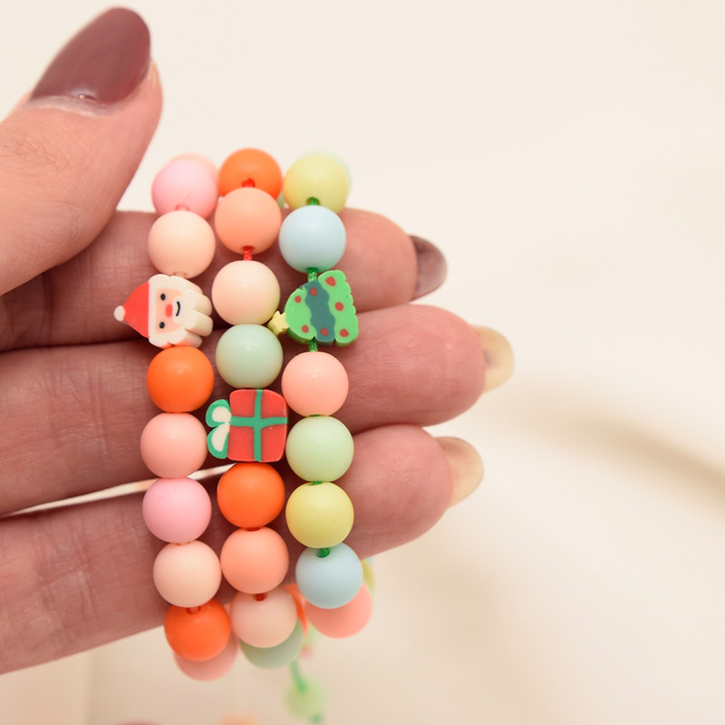 دستبند بچگانه دلنار گالری مدل بابابرفی بسته 3 عددی