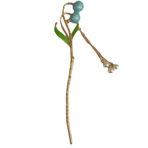 گیره مو زنانه مدل کانزاشی طرح گوی آویزدار
