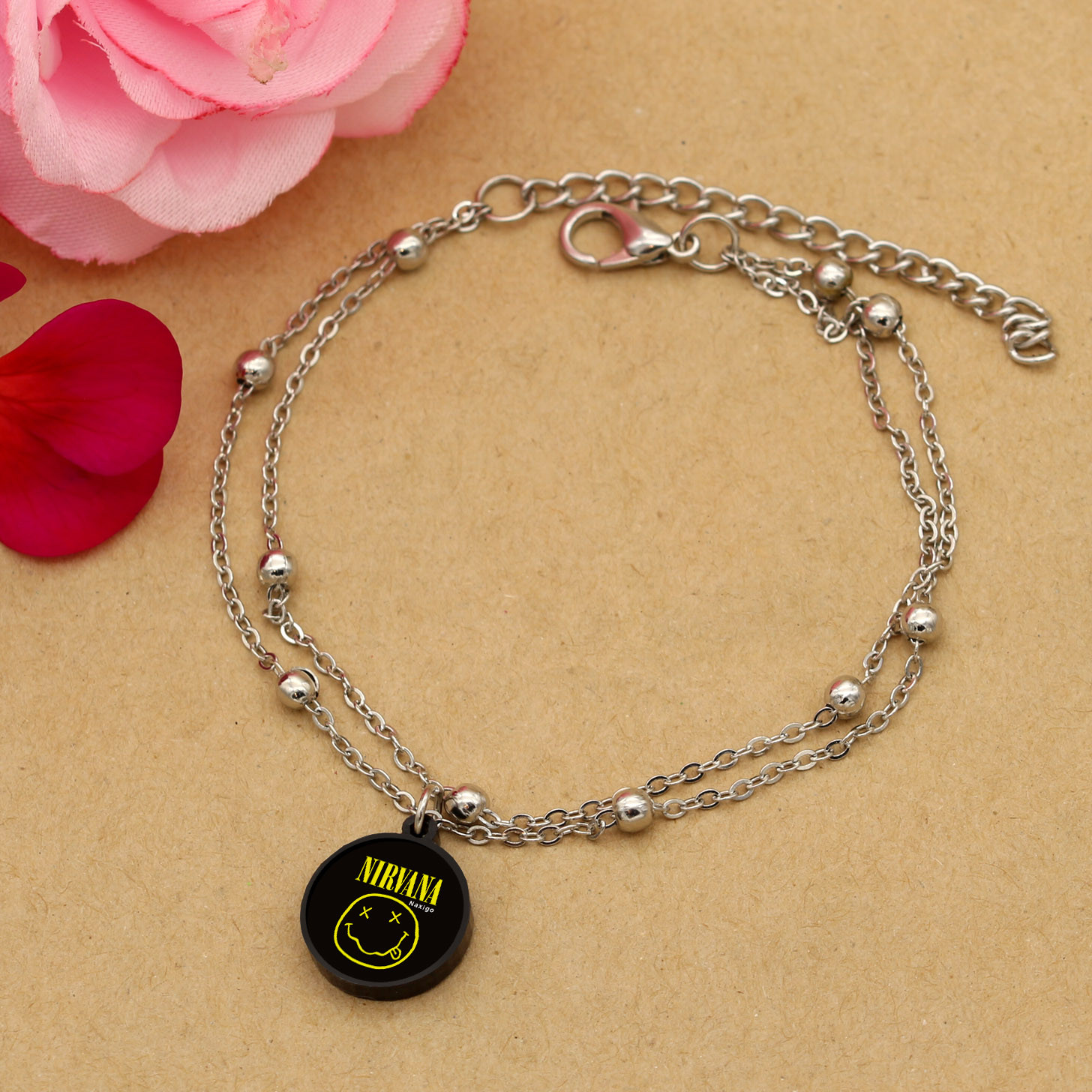 پابند زنانه ناکسیگو مدل شب تاب طرح Nirvana کد LB7449