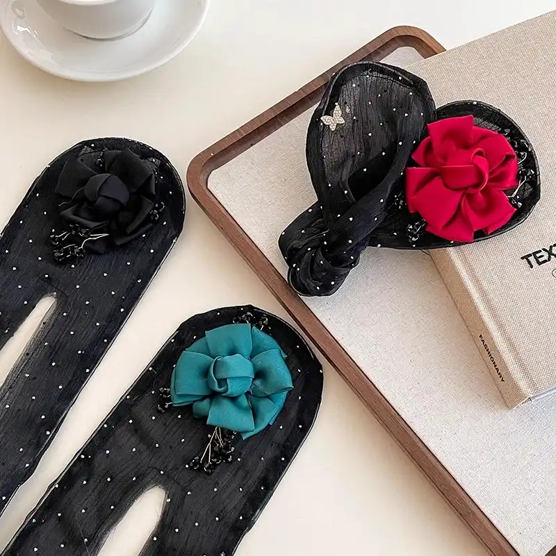 گیره مو زنانه مدل باندفر طرح گل نیلوفر