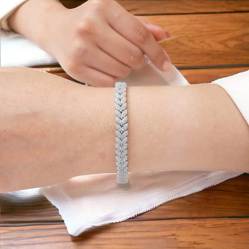 دستبند نقره زنانه گالری رضازاده مدل گلبرگ کد 0153