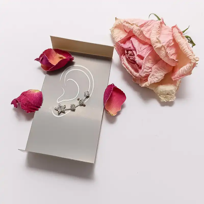 گوشواره نقره زنانه مدل تک گوش ستاره