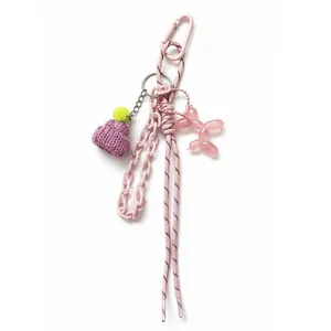 جاکلیدی مدل چارم بگ طرح سگ بادکنکی و کلاه زمستانی