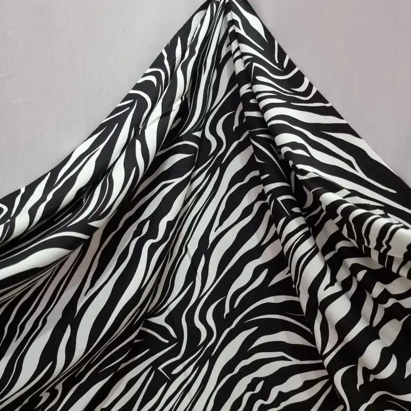 پارچه لباس مدل کودری نخی طرح پلنگی کد Z